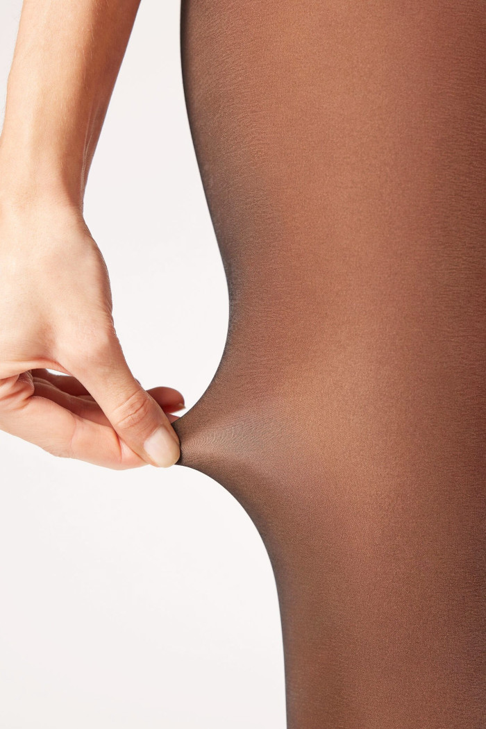 Колготки з прозорим ефектом та коригуючим поясом Caimax 673 180d